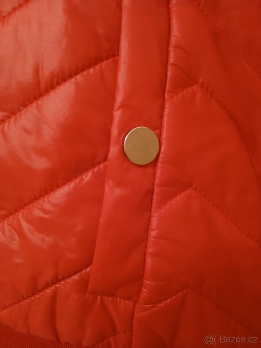 Dámská prošívaná vestička vel.44