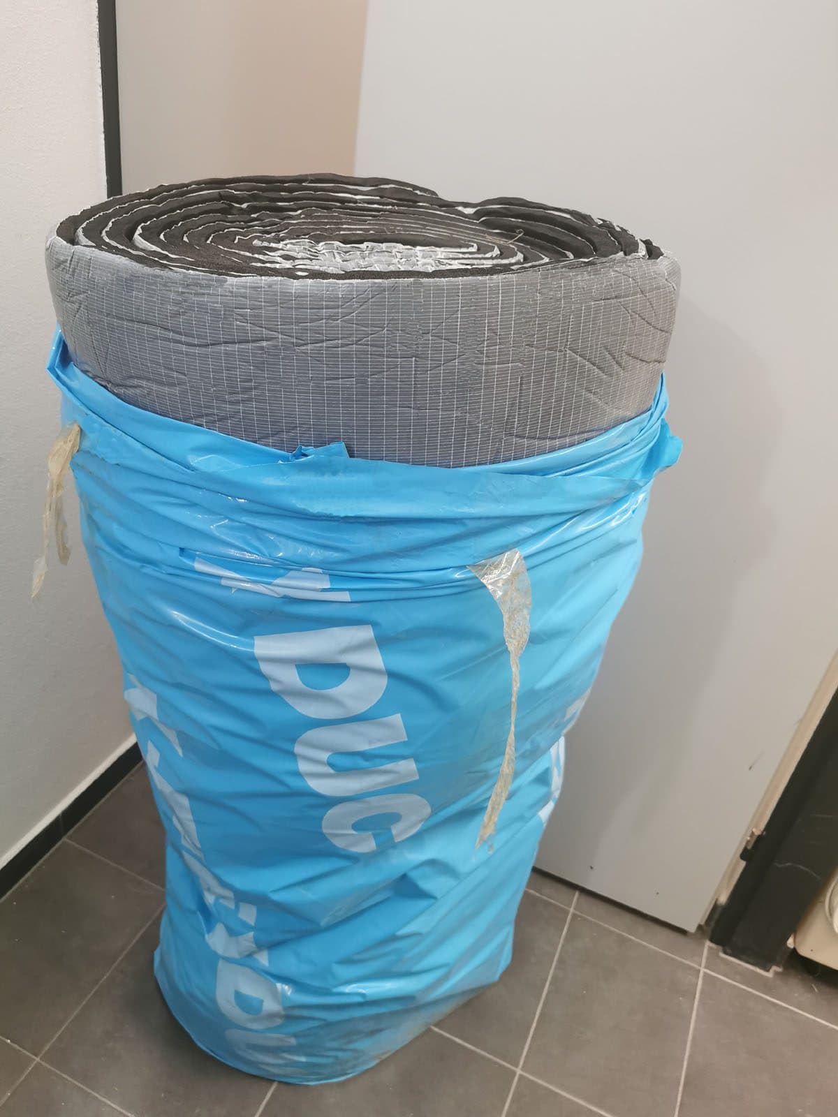 New, unused roll of premium thermal and acoustic insulation K-Flex ST DUCT